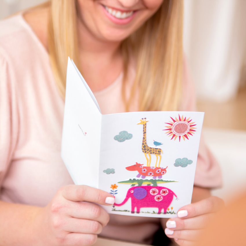 Woman Holiding Animals Baby Greeting Card