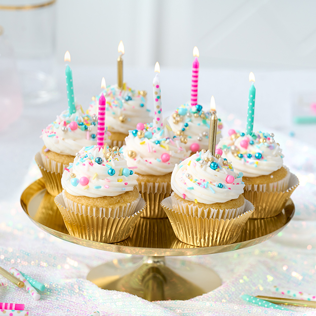 cupcakes with colorful candles