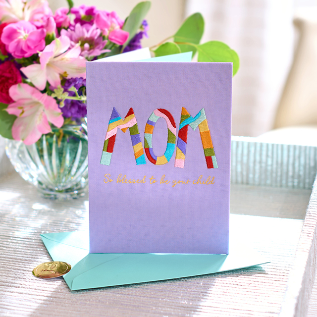 "Mom" Mother's Day card and flowers