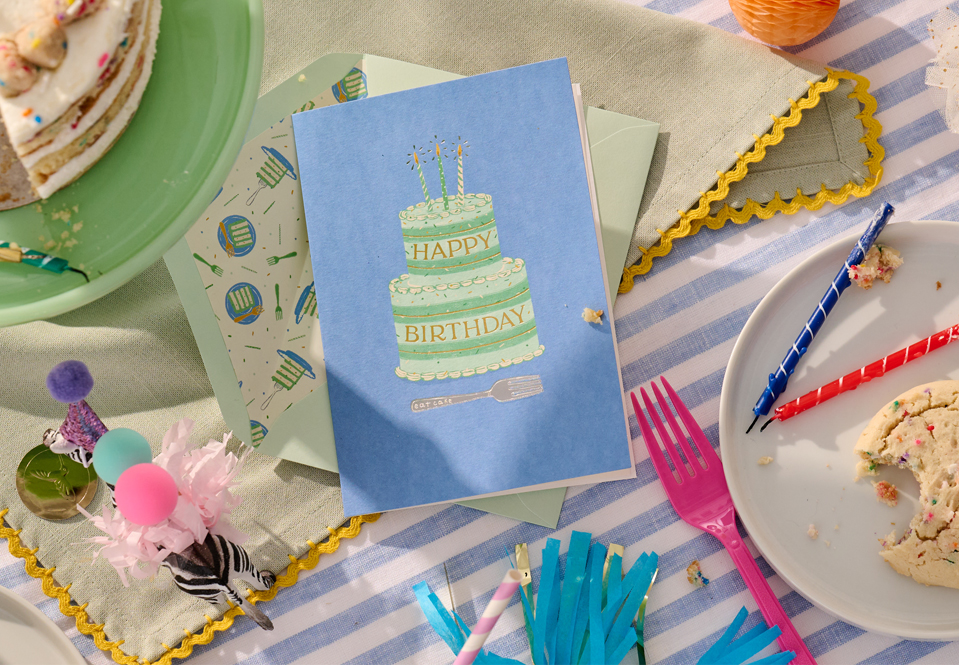 Cake greeting card on a table at a party