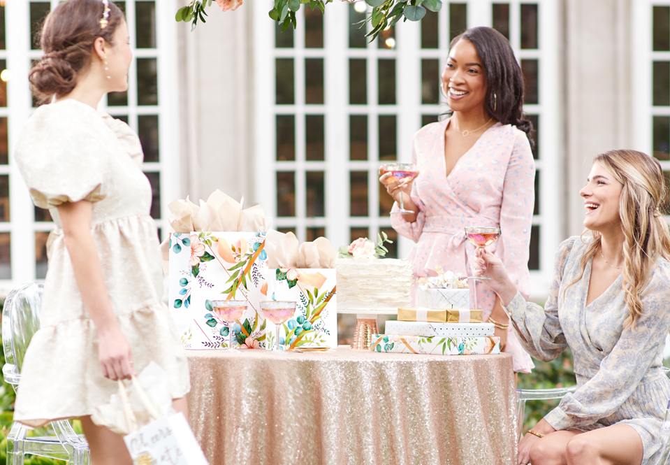 Girls having an outdoor wedding celebration.