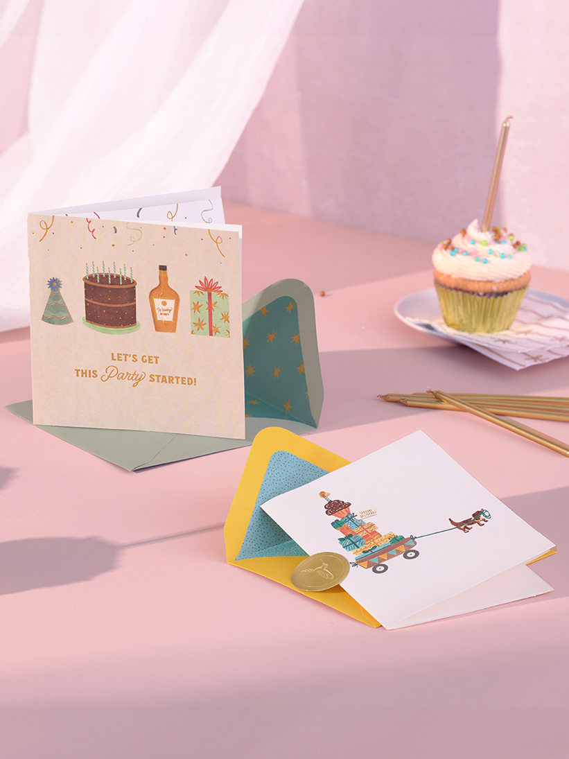 2 birthday cards on a table.