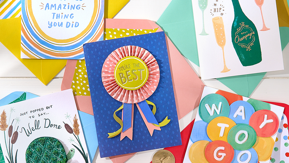 Greeting cards spread on a table viewed from the top