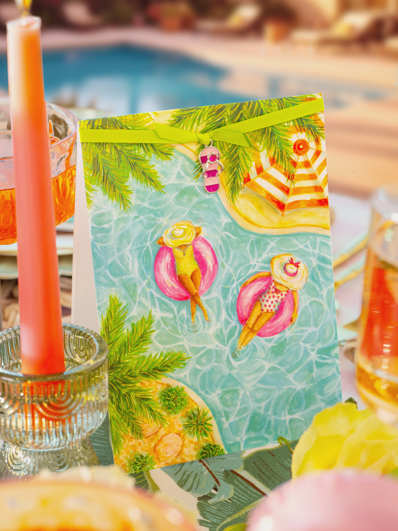 Greeting card with friends floating in a pool.