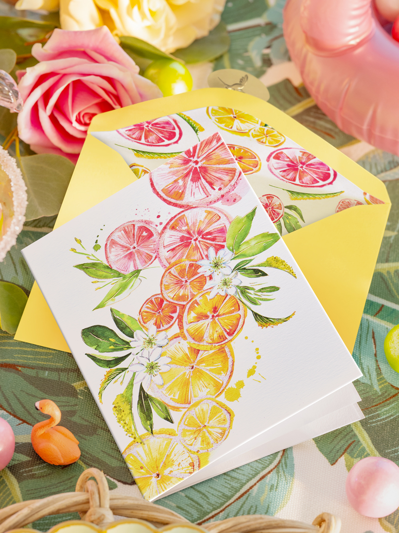 Greeting card with slices of citrus fruit.