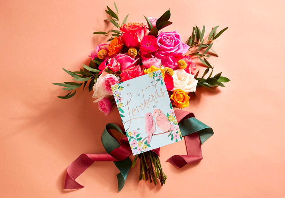 Lovebirds card on a floral background