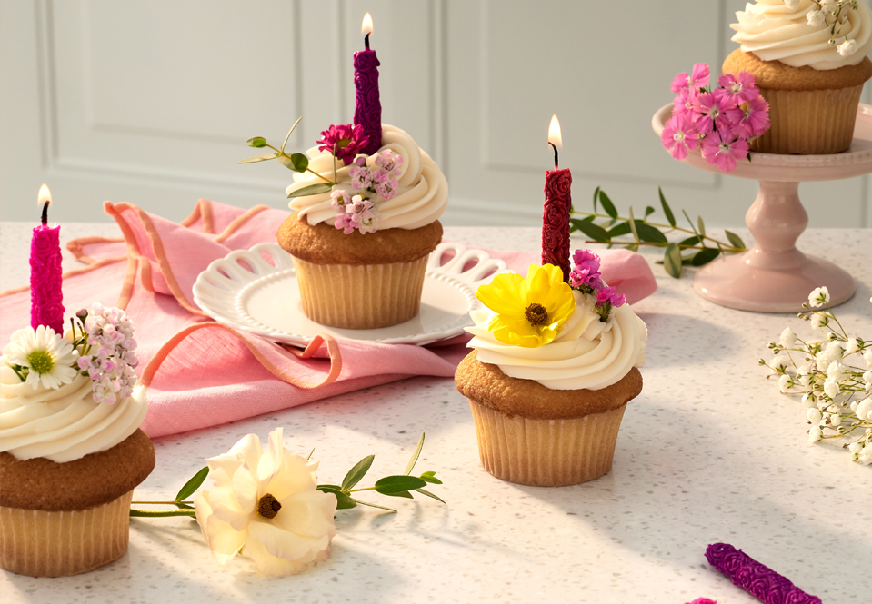 Birthday candles on fancy cupcakes